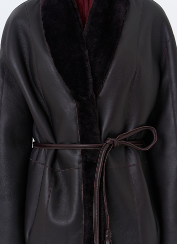 Женская двухсторонняя дубленка с декоративным поясом