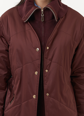 Женская утепленная куртка с поясом