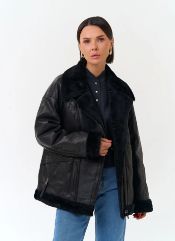 Женский пуховик из натуральной кожи фото