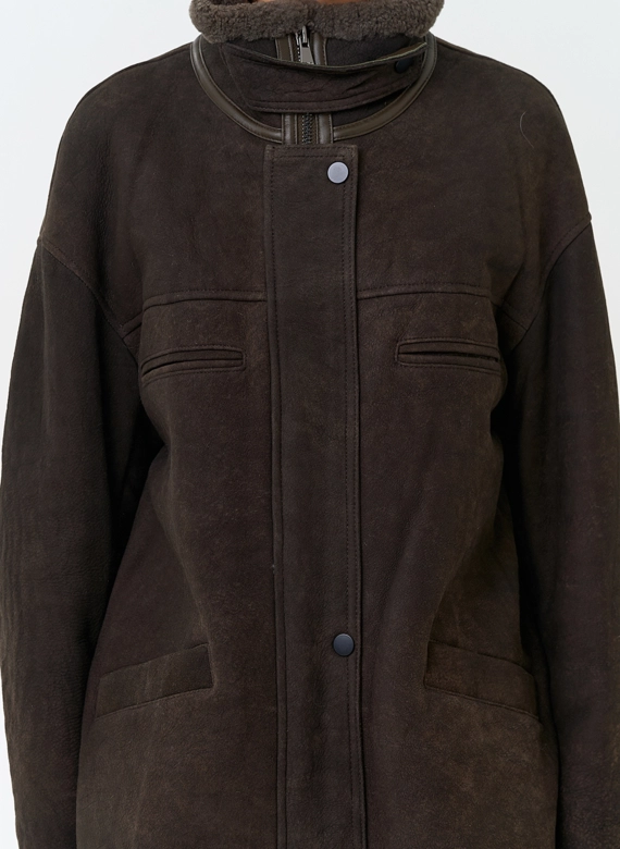 Натуральная дубленка с воротником стойкой фото